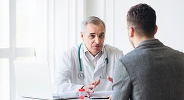 a man being examined by a specialist